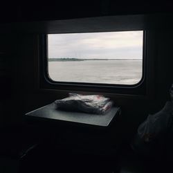 Sea seen through glass window
