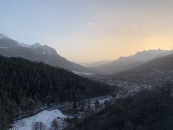 Scenic view of snowcapped mountains against sky