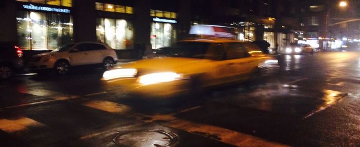 Traffic on street at night