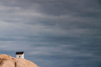 Built structure against cloudy sky