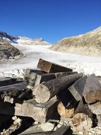 View of landscape against clear blue sky