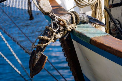 Close-up of rope tied to fishing boat