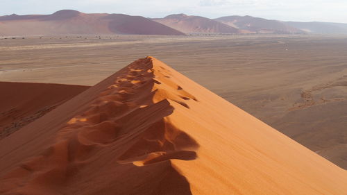 Scenic view of desert against clear sky