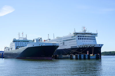 Two large ro-ro cargo and passenger ferries moored in the seaport