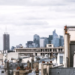 High angle view of buildings in city against sky