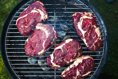 High angle view of meat on barbeque