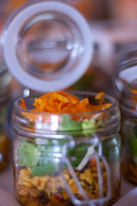 Close-up of ice cream in jar on table