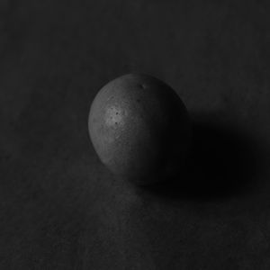 Close-up of apple on black background