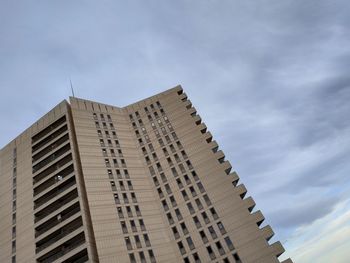 Low angle view of modern building against sky