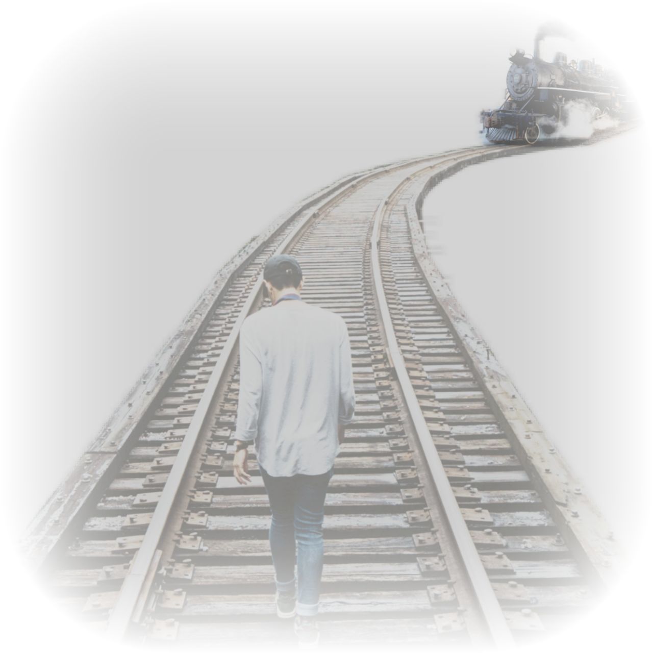 REAR VIEW OF MAN STANDING ON RAILROAD TRACKS