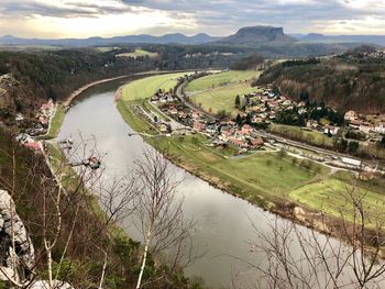 High angle view of river amidst landscape against sky