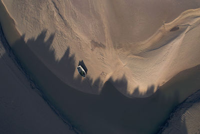 High angle view of sand at beach