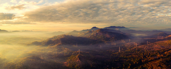 Scenic view of mountains against sky during sunset