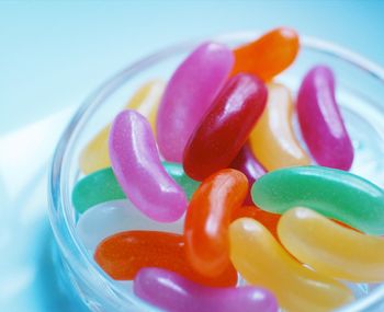 Close-up of multi colored jellybeans in bowl