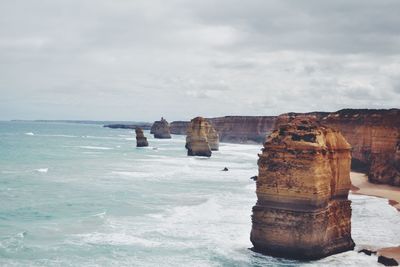 Scenic view of sea against cloudy sky