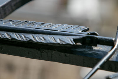 Close-up of old metal railing