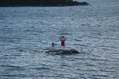 Man on boat in sea