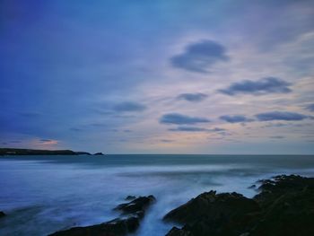 Scenic view of sea against sky at sunset