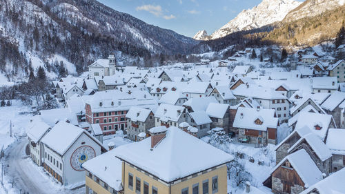 Snow covered houses in town