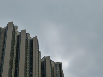 Low angle view of skyscrapers against sky