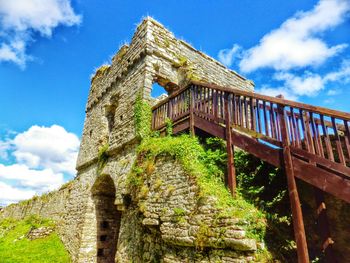 Low angle view of built structure against blue sky