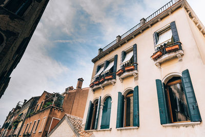 Low angle view of residential building against sky