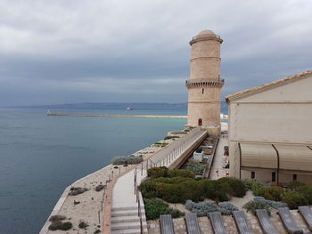 Scenic view of sea against cloudy sky