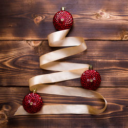 Directly above shot of christmas decoration on wooden table