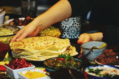 Close-up of man preparing food