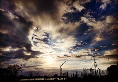 Low angle view of dramatic sky during sunset