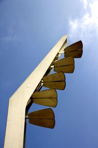 Low angle view of airplane against sky