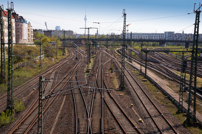 Train on railroad tracks against sky