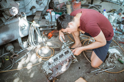 High angle view of man working on street