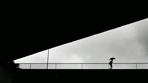 Low angle view of railings against sky