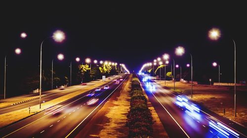 Light trails on road at night