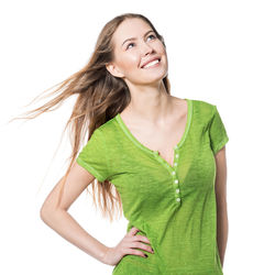 Portrait of a smiling young woman over white background