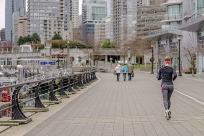 Woman walking on city street