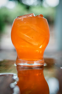 Close-up of orange juice in glass