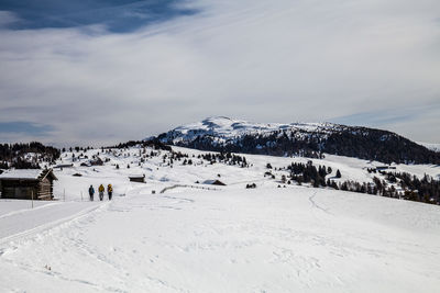 Scenic view of snow covered mountain against sky