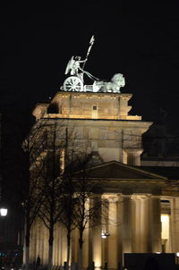 Low angle view of statue at night