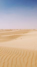 Scenic view of desert against clear sky