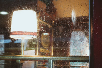 Wet glass window in rainy season