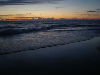 Scenic view of sea at sunset