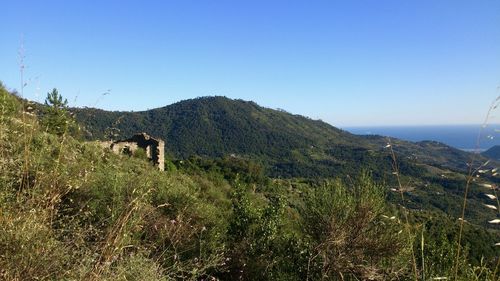 Scenic view of mountains against clear sky