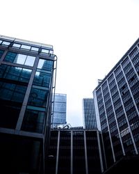 Low angle view of modern building against clear sky
