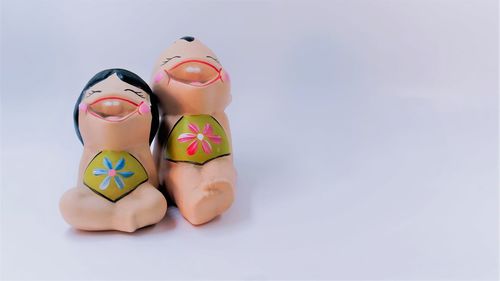 Close-up of stuffed toy against white background