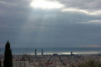 Buildings in city against sky