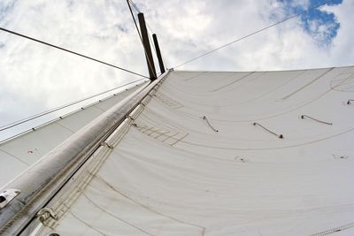 Low angle view of mast against sky