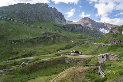 Scenic view of landscape and mountains against sky