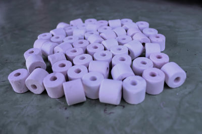 High angle view of purple candies on table
